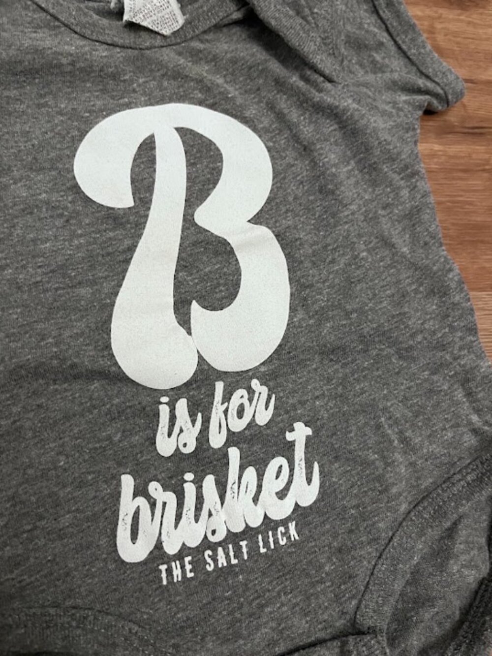 The Salt Lick "B is for brisket" onesie